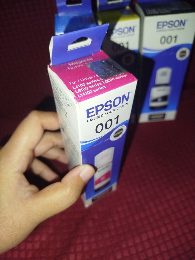 EPSON 001 Ink (Category: Printers, Scanners & Copiers) located in Quezon City. Submitted by tugeyds (Listing ID 1464462631, Image 3). Description: Brandnew, sealed. 4 colors, bundle..