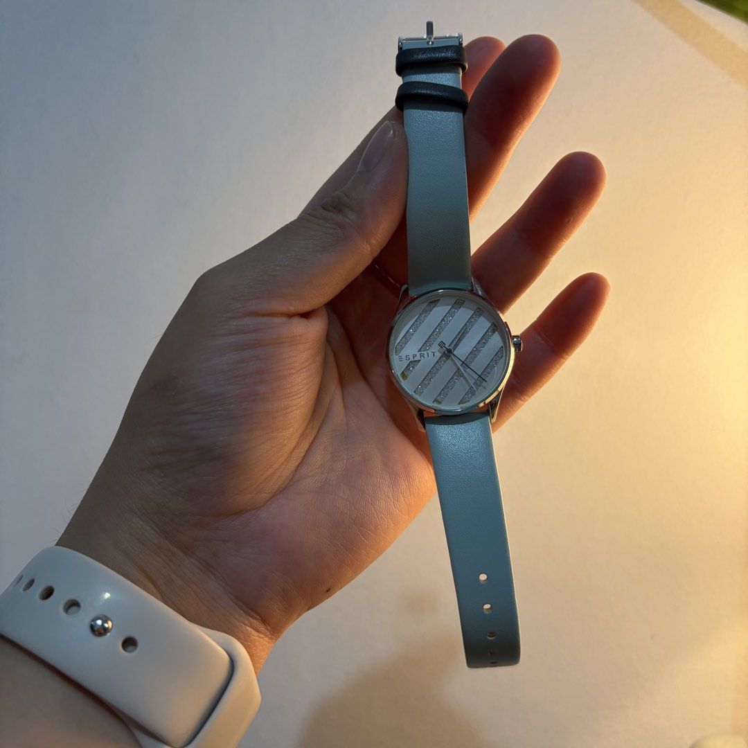 Esprit Watch Quartz Light Blue Strap (Category: Women's Watches) located in Manila. Submitted by ajdeclutter (Listing ID 1464533613, Image 2). Description: - Esprit watch with a stylish light blue strap. - Unique watch face featuring a striped design with subtle glitter accents. - Water resistant up to 30 meters (3 ATM). - Crafted with durable all stainless steel construction. - Includes original Esprit box - never been used; just in storage - ca