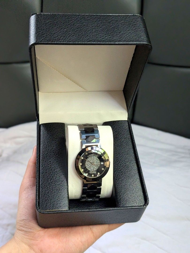 Essence Tungsten Crysta Sapphire Watch (Category: Women's Watches) located in Quezon City. Submitted by nnncorner (Listing ID 1464439312, Image 1). Description: Essence Ceramic Tungsten Crystal Sapphire Bezel Watch 100% Original 100% All parts are original 9/10 condition No scratches or hairlines on glass face Still in presentable condition has very small flaw on strap (unnoticeable tho unless OC ka) Butterfly Deployment Clasp Closure Super prett