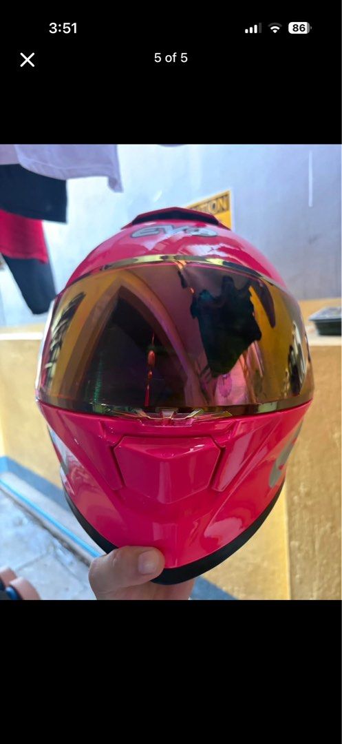 EVO Pink Full Face Motorcycle Helmet with Mirrored Visor (Category: Bicycles) located in Manila. Submitted by barney1219 (Listing ID 1464430193, Image 1). Description: - Pink EVO full-face helmet - Eye-catching mirrored visor with multi-color reflection - Aerodynamic design for a sleek look - Vents for optimal airflow and comfort - Perfect for riders who want to make a statement.