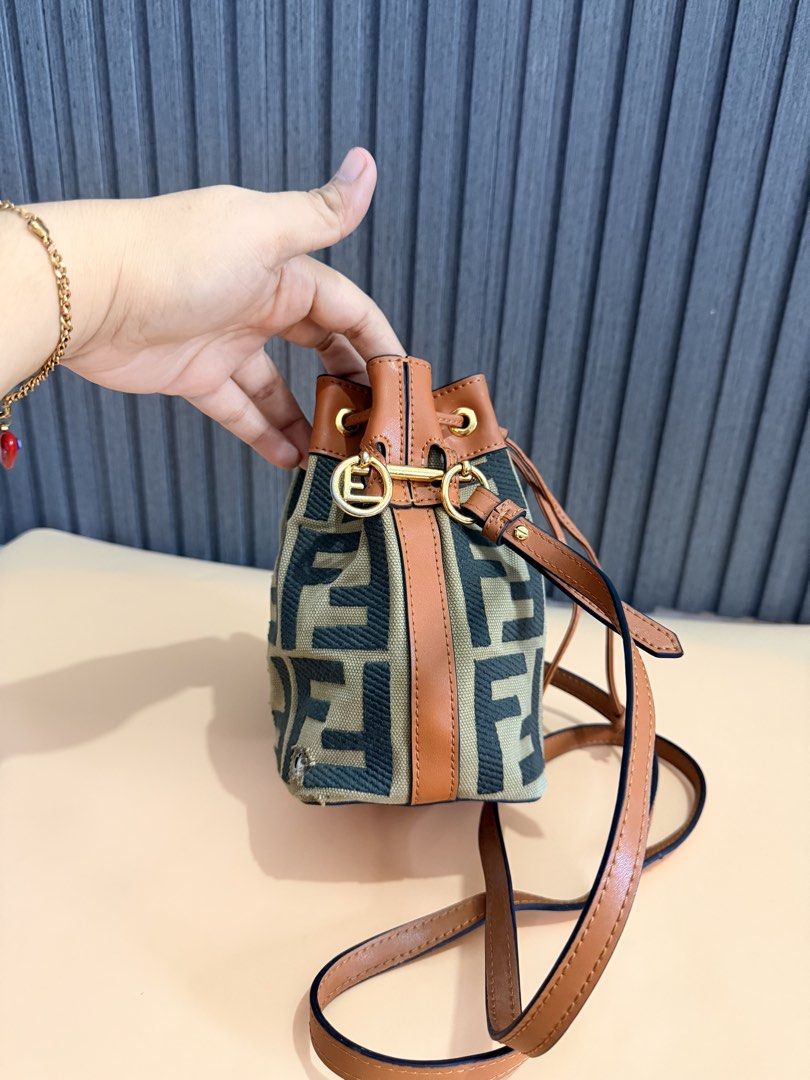 Fendi canvas mini bucket bag (Category: Luxury Bags & Wallets) located in Cavite. Submitted by aiznpreluvv (Listing ID 1464401449, Image 3). Description: Last pic issue.
