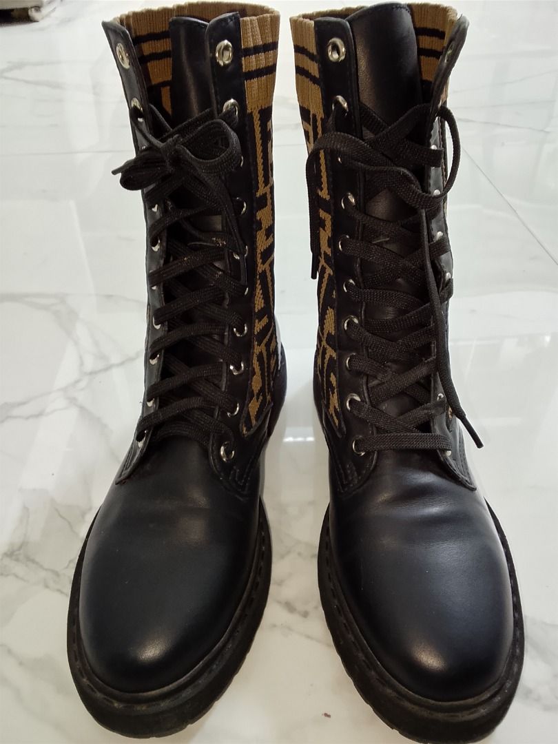 Fendi FF Monogram combat boots (Category: Boots) located in Quezon City. Submitted by kema2191 (Listing ID 1464414269, Image 2). Description: Fendi combat boots with iconic FF monogram fabric - Black leather details and laces - Statement piece for a designer flair - Features Fendi Roma logo on the insole - Perfect for fashion-forward individuals.