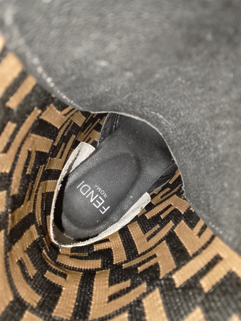 Fendi FF Monogram combat boots (Category: Boots) located in Quezon City. Submitted by kema2191 (Listing ID 1464414269, Image 3). Description: Fendi combat boots with iconic FF monogram fabric - Black leather details and laces - Statement piece for a designer flair - Features Fendi Roma logo on the insole - Perfect for fashion-forward individuals.