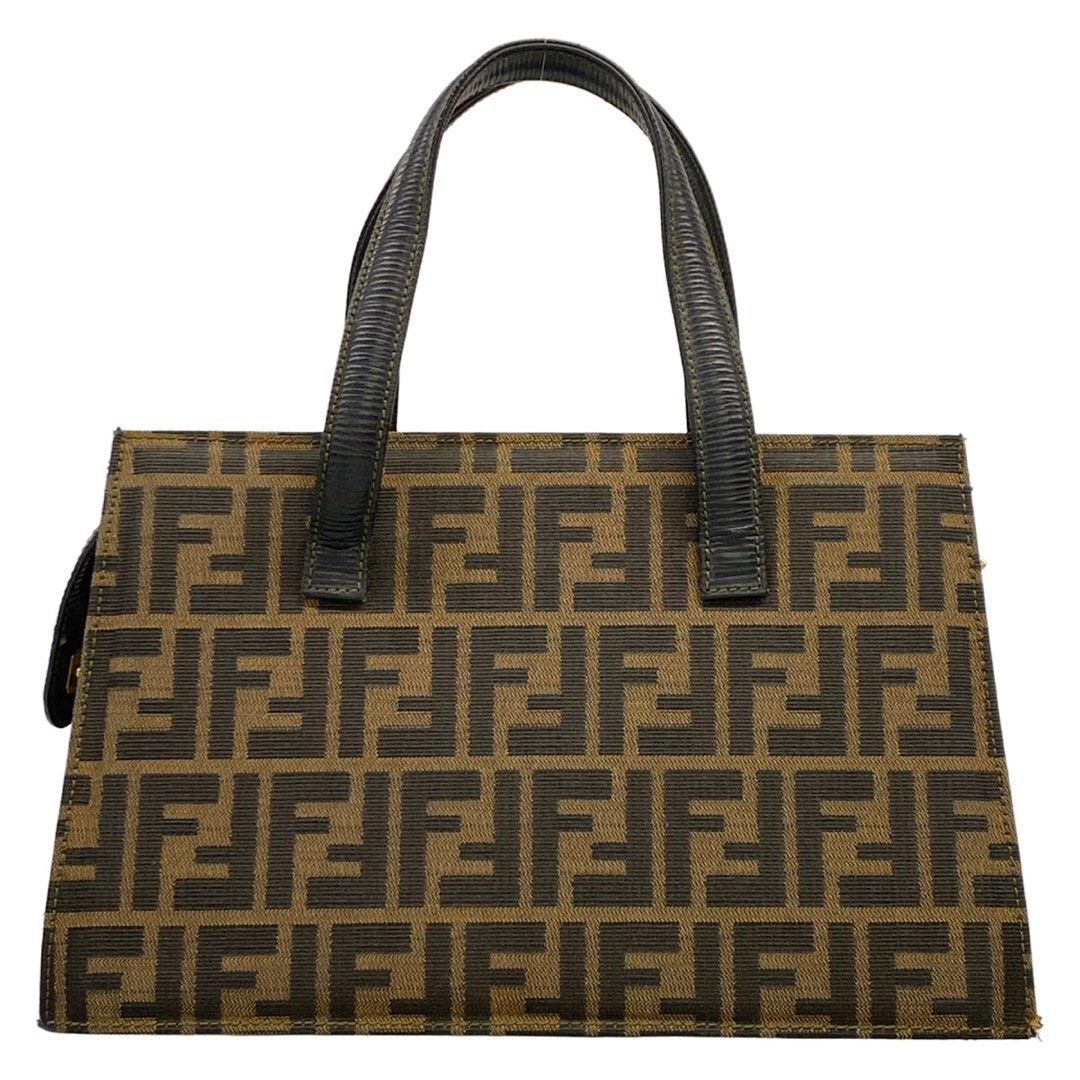 Fendi Handbag, Zucca pattern, black and brown leather (Category: Shoulder Bags) located in Las Pinas. Submitted by daisuki_japan_luxury_by_reiko (Listing ID 1464365001, Image 3). Description: brand FENDI Genre handbag Product Name Zucca pattern Size indicated none Actual size Height: Approx. 18.5 cm Width: Approx. 27 cm - 29.5 cm Depth: Approx. 12.5 cm Handle drop: Approx. 12 cm (Measurements taken at the time of photography) Total weight: Approx