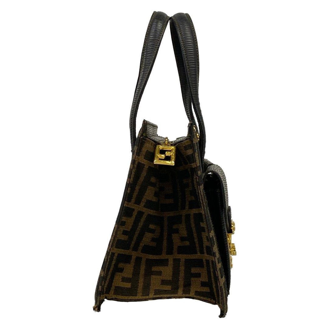 Fendi Handbag, Zucca pattern, black and brown leather (Category: Shoulder Bags) located in Las Pinas. Submitted by daisuki_japan_luxury_by_reiko (Listing ID 1464365001, Image 2). Description: brand FENDI Genre handbag Product Name Zucca pattern Size indicated none Actual size Height: Approx. 18.5 cm Width: Approx. 27 cm - 29.5 cm Depth: Approx. 12.5 cm Handle drop: Approx. 12 cm (Measurements taken at the time of photography) Total weight: Approx