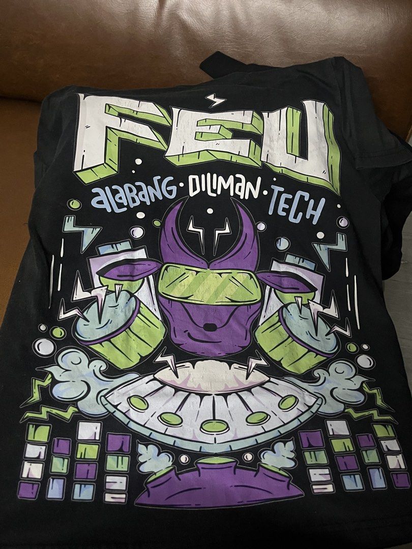 FEU Shirt (Category: Shirts) located in Paranaque City. Submitted by hearty444 (Listing ID 1464483526, Image 1). Description: - concert shirt - has cracks - size small.