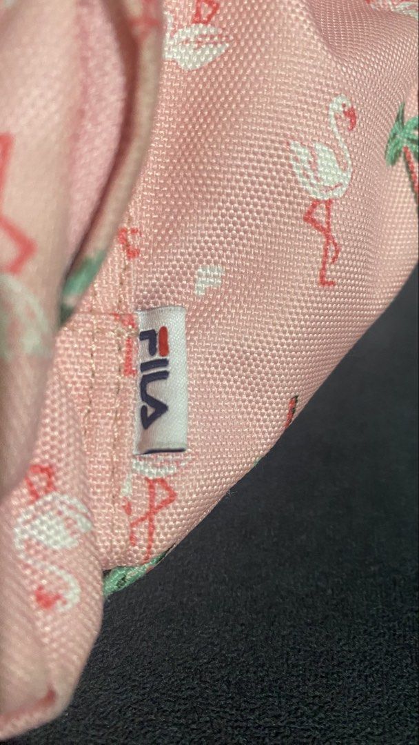 Fila Belt/Crossbody Bag (Category: Belt bags, Clutches and Pouches) located in Lapu Lapu. Submitted by any_thrift (Listing ID 1464519792, Image 3). Description: In good condition Few signs of wear Can fit long wallet and phones.