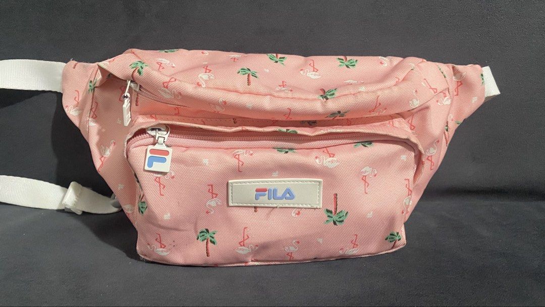 Fila Belt/Crossbody Bag (Category: Belt bags, Clutches and Pouches) located in Lapu Lapu. Submitted by any_thrift (Listing ID 1464519792, Image 1). Description: In good condition Few signs of wear Can fit long wallet and phones.