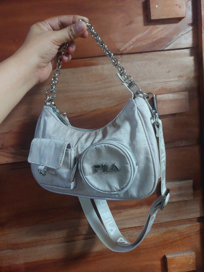 FILA HERITAGE 2023 (Category: Luxury Bags & Wallets) located in Cagayan de Oro. Submitted by lj100614 (Listing ID 1464483575, Image 3). Description: color:cream no flaws ganda nang condition 2 way.