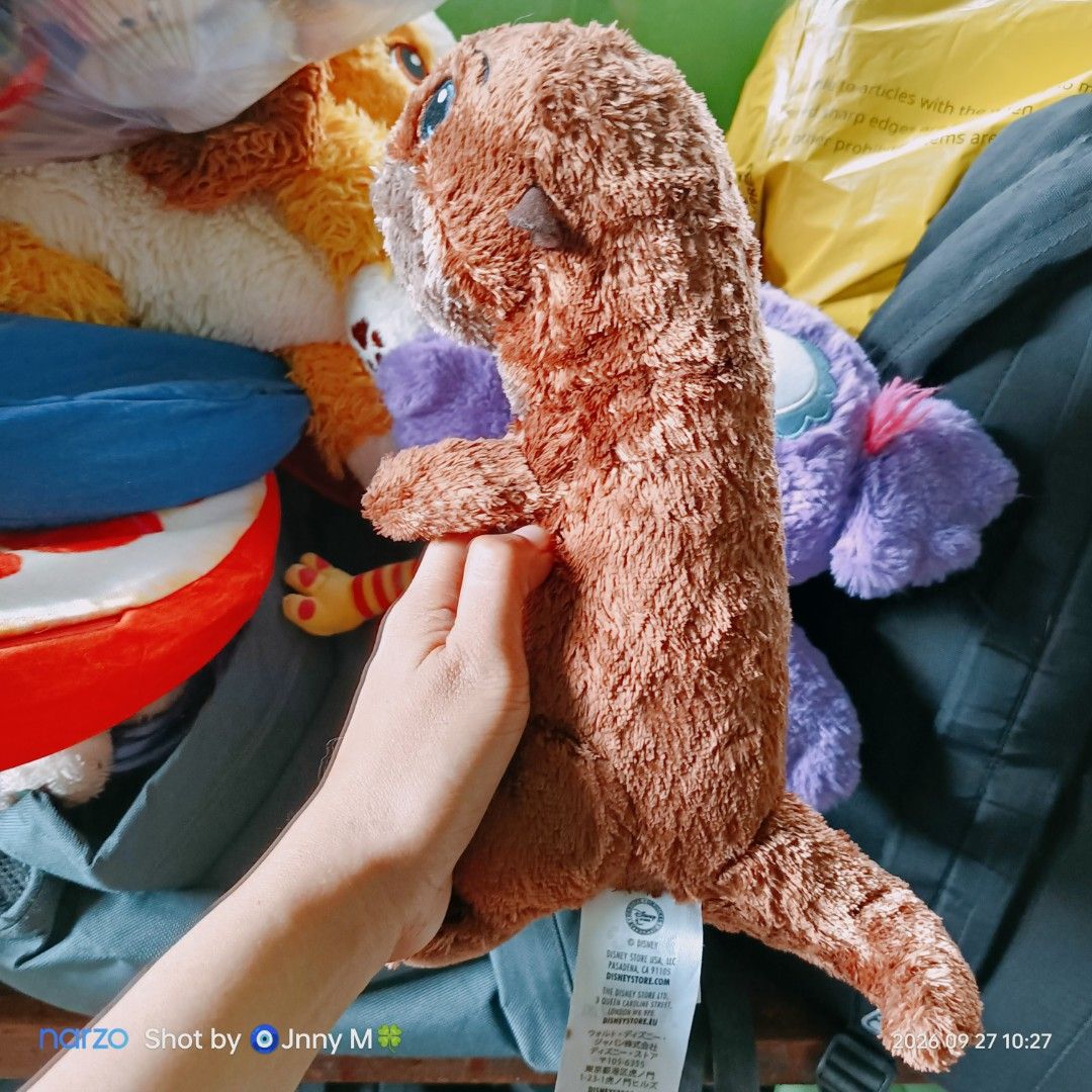 Finding Dory Otter-Disney Store Plush Toy (Category: Plushies & Soft Toys) located in Taguig. Submitted by mhayestufftoys (Listing ID 1464425081, Image 3). Description: - Adorable otter plush from the Disney Store. - Super soft and cuddly material. - Approximately 8 inches tall. - Ideal for Disney fans and collectors. - Perfect for display or playtime..