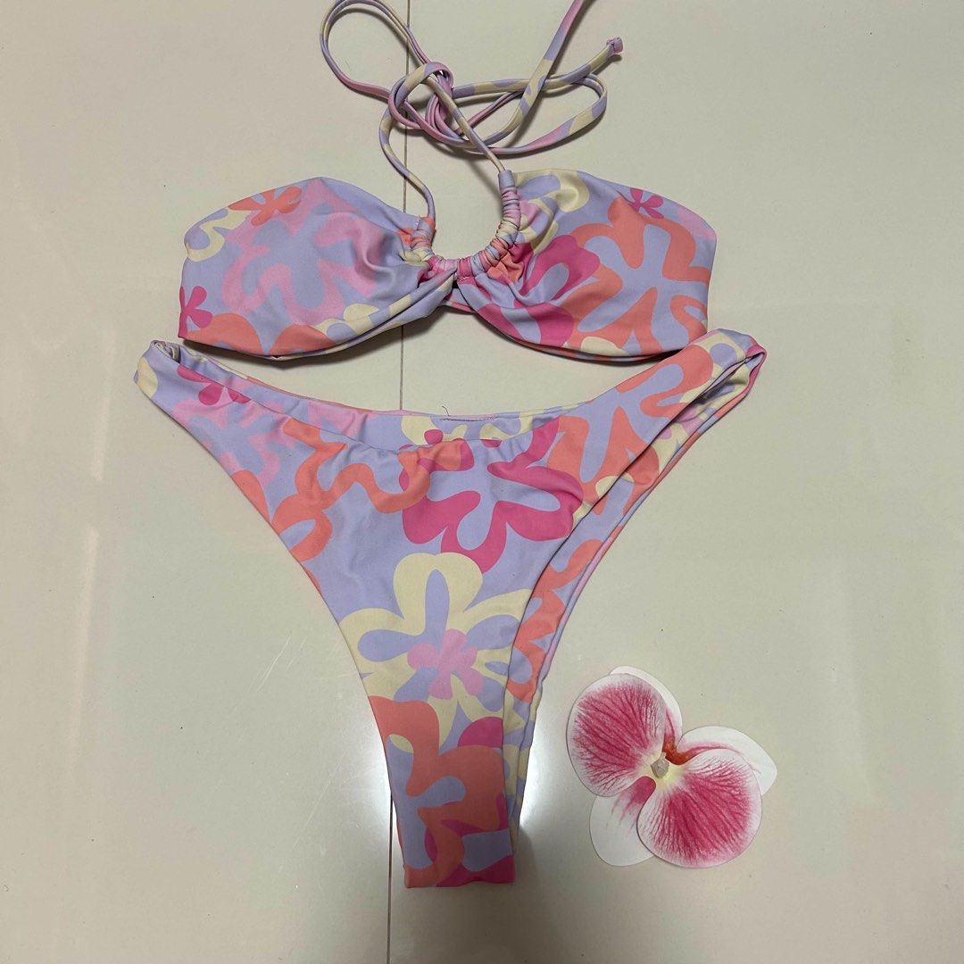 Floral Print Bikini Set with Smocked Top (Category: Bikinis & Swimsuits) located in Cainta. Submitted by cesiacute (Listing ID 1464501608, Image 2). Description: Preloved & Never been used swimsuits for sale. Picture 1&2 Used Once. Picture 3-6 Never been used. SIZE XS Gcash/Maribank payment..