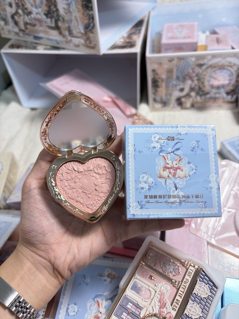 Flower Knows Bunny Garden Series Rabbit Blush (Category: Makeup) located in Caloocan City. Submitted by Mariane_ (Listing ID 1464483395, Image 2). Description: - 02 Bunny lullaby - Super cute heart-shaped blush compact - Features a lovely embossed floral design - Adorable bunny motif packaging - Comes in a pretty blue box with lace trim - Perfect for adding a pop of color to your cheeks.