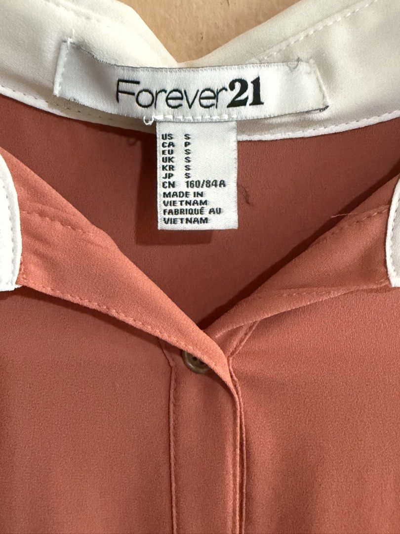 Forever 21 Collared Long Sleeve Blouse (Category: Longsleeves) located in Manila. Submitted by only_alyssacloset (Listing ID 1464398327, Image 2). Description: Forever 21 with cream collared Long sleeve blouse Color: Dusty Rose (Teracotta/Dark peach) Size: Small to Medium .