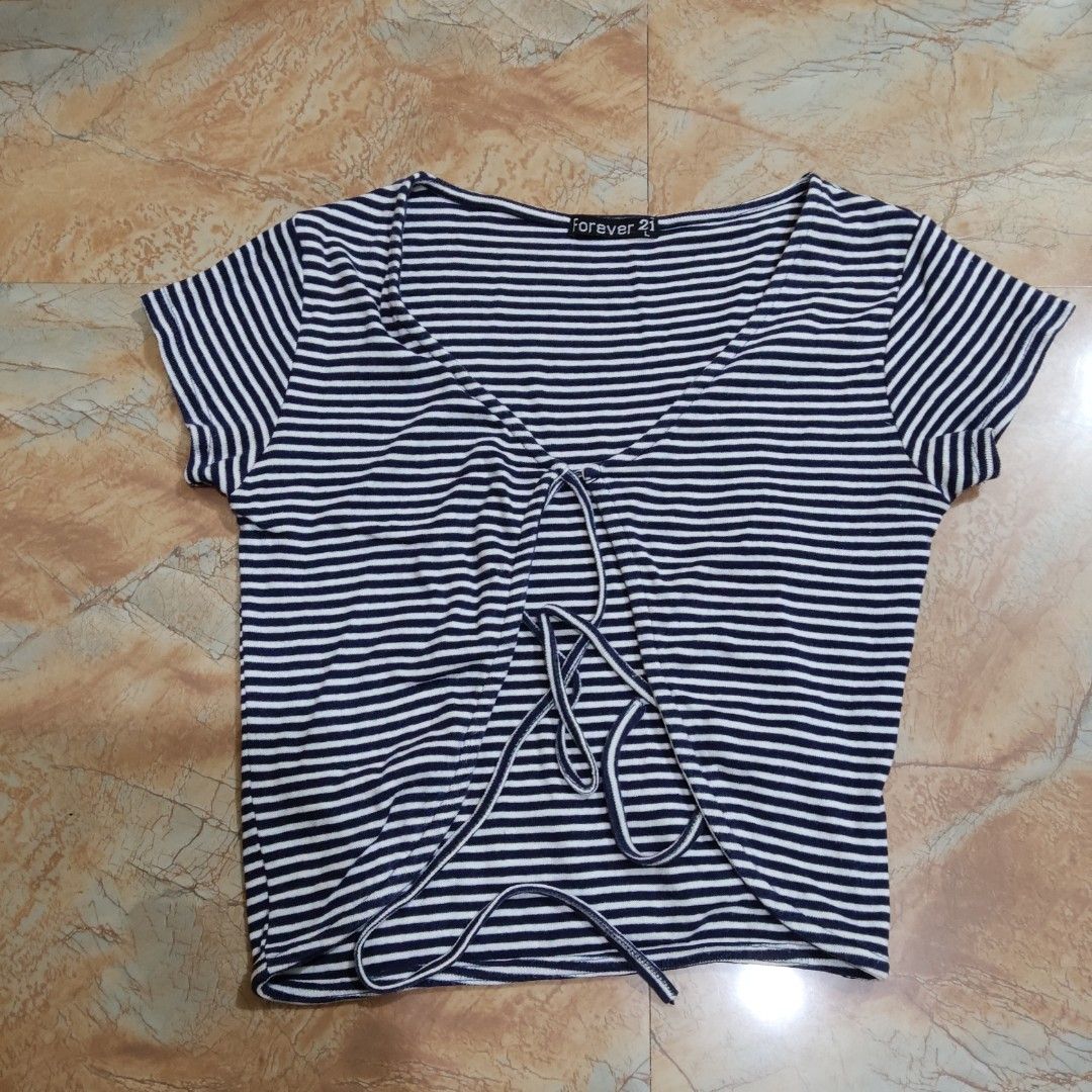 Forever 21 Striped Wrap Top (Category: Others Tops) located in Valenzuela. Submitted by ecasprelvd (Listing ID 1464450584, Image 2). Description: Navy & white striped top Wrap-style front with tie detail Short sleeves Forever 21, tagged large but fits small Valenzuela Delivery: Lalamove / J&T.