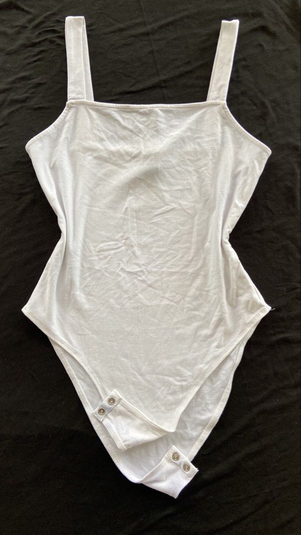 Forever 21 White Square Neck Bodysuit (Category: Sleeveless) located in Bauang. Submitted by deguzmanch72528 (Listing ID 1464379659, Image 1). Description: Strechable No flaws or issue .