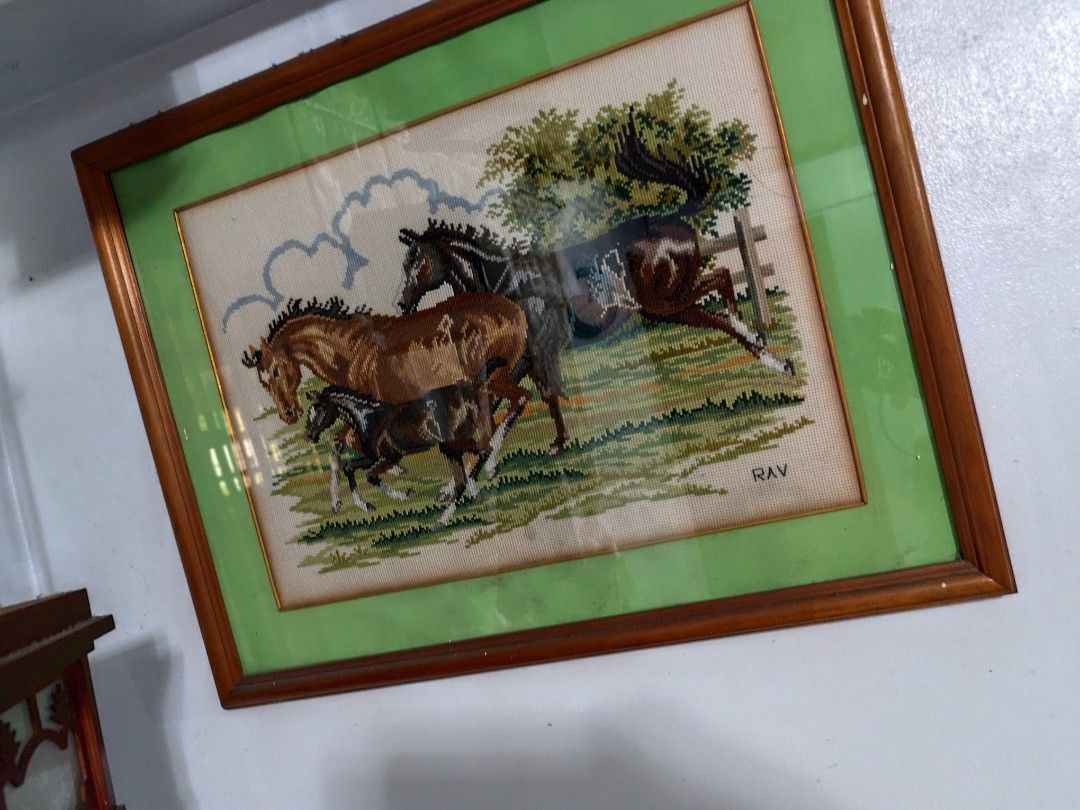 Framed Cross-Stitch Art - Running Horses (Category: Frames & Pictures) located in Manila. Submitted by marriage031073advocate (Listing ID 1464431983, Image 1). Description: - Handmade cross-stitch artwork - Features horses running in a field - Comes with a wooden frame - Includes a light green mat - Signed by artist 'RAV' - Ideal for horse lovers and unique wall decor - Ready to hang.