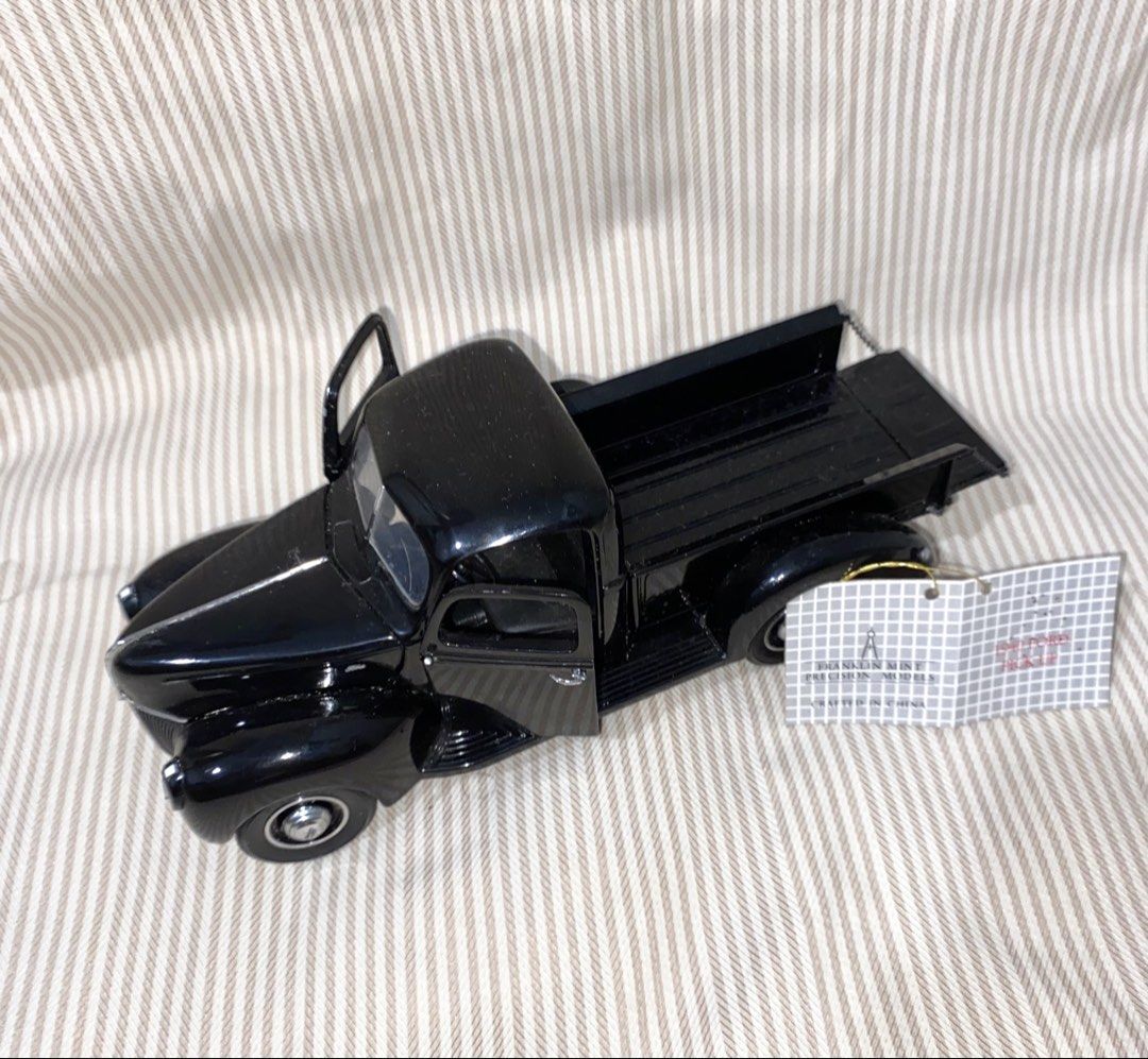 Franklin Mint Precision Models 1940 Ford Pickup (Category: Vehicle & Diecast Models) located in Ajuy. Submitted by shopnook (Listing ID 1464375276, Image 2). Description: Franklin Mint Precision Models 1940 Ford Pickup • Scale: 1:24 • Color: Black • Good condition • With original tag • No original box • Great for diecast collectors and display • Detailed vintage-style model from Franklin Mint Precision Models.