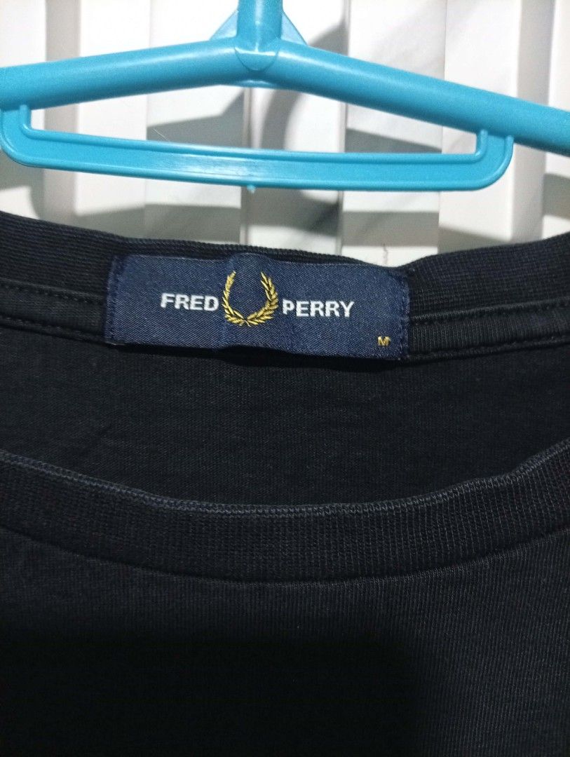 Fred Perry Mixed Graphic Shirt ( Authentic ) (Category: Tshirts & Polo Shirts ) located in Barotac Nuevo. Submitted by john.pritz (Listing ID 1464469881, Image 3). Description: Fred Perry Mixed Graphic Shirt ( Authentic ) Like new condi no issue Size medium on tag Width 20 Length 27.