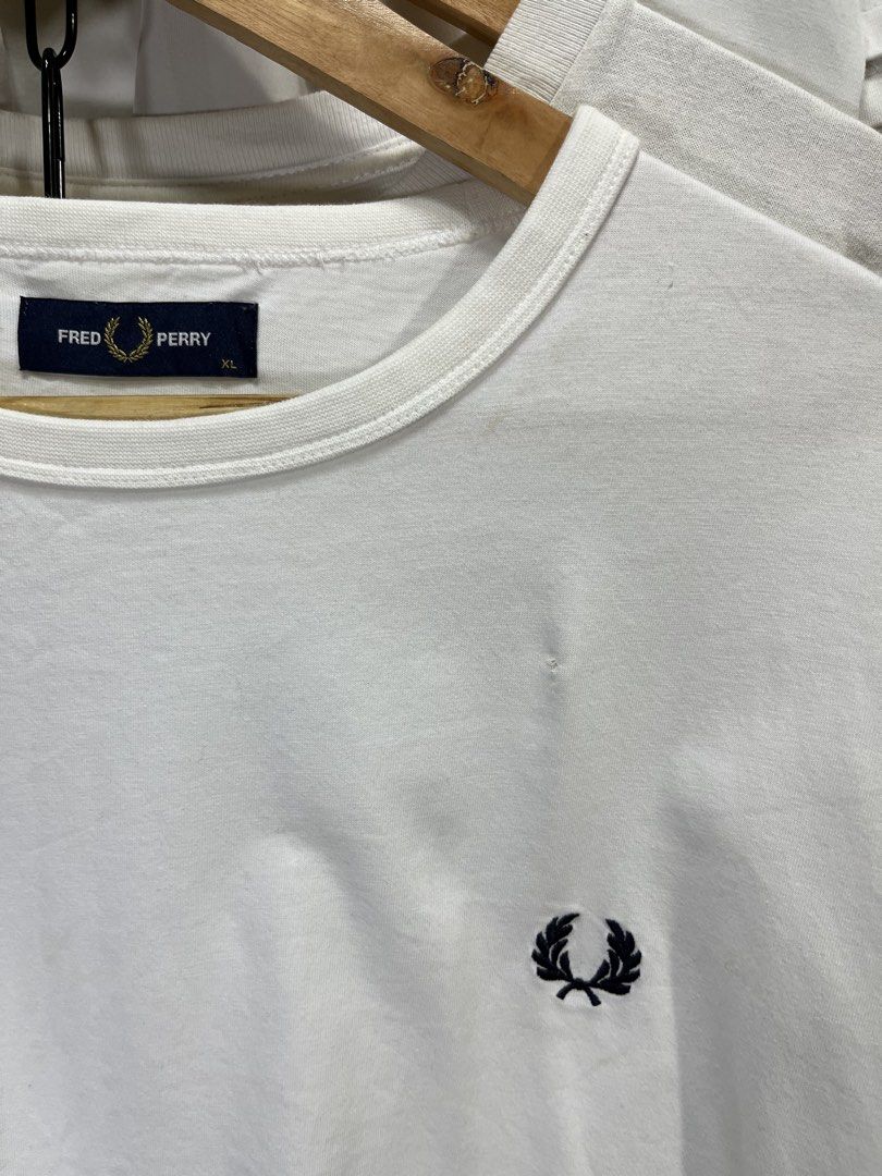 FRED PERRY SHIRT (Category: Formal Shirts) located in Manila. Submitted by aldrenyap109491 (Listing ID 1464360416, Image 3). Description: 💎FRED PERRY (EMBROIDERED) 🔳CONDITION:9.5/10 GOOD 🔳COLOR RATE:9.7/10 🔳DIMENSION:29X23.5 🔳BEST FIT: XL 🔳MOP:GCASH/CASH 🟥ISSUE: 1REPAIRED PINHOLE MINE:₱550 (FREE SHIPPING) (AUTOMATICALLY YOURS) 📍 POBLACION PUROK 5 KOLAMBUGAN LDN (9207).