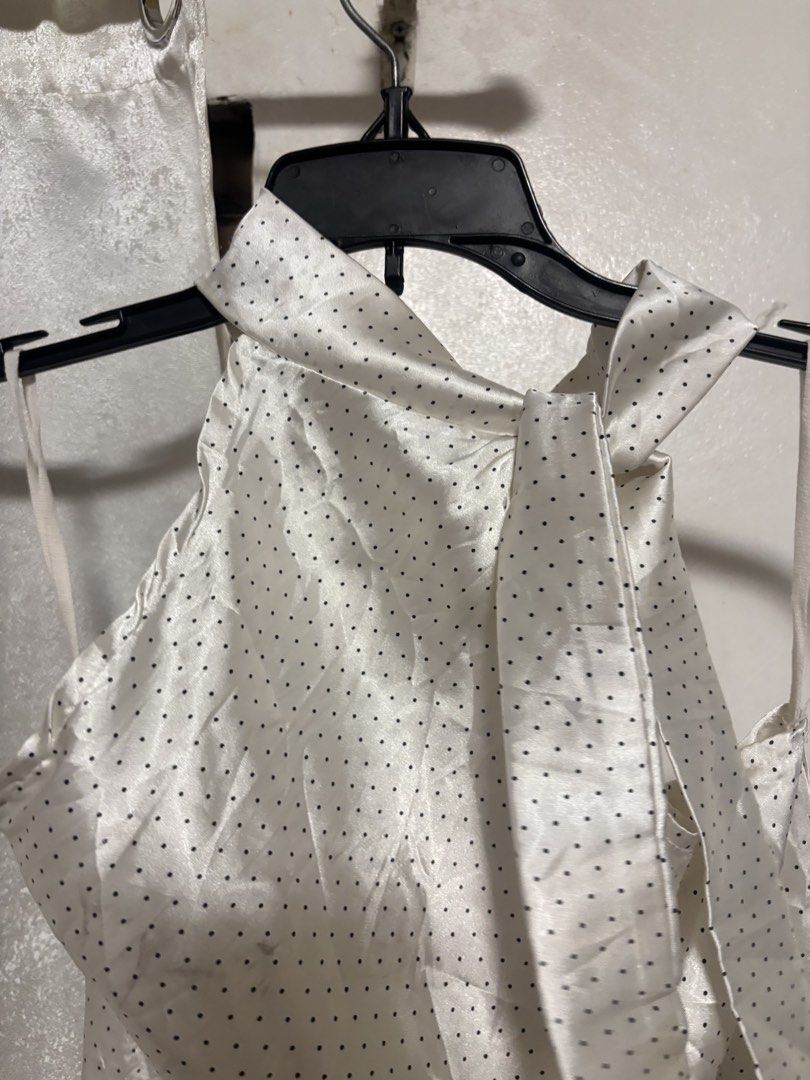 FREE SF White Polka Silk Blouse (Category: Blouses) located in Pozorrubio. Submitted by ryeisdecluttering (Listing ID 1464449402, Image 2). Description: Size small J&T express Gcash/Maya/BPI.