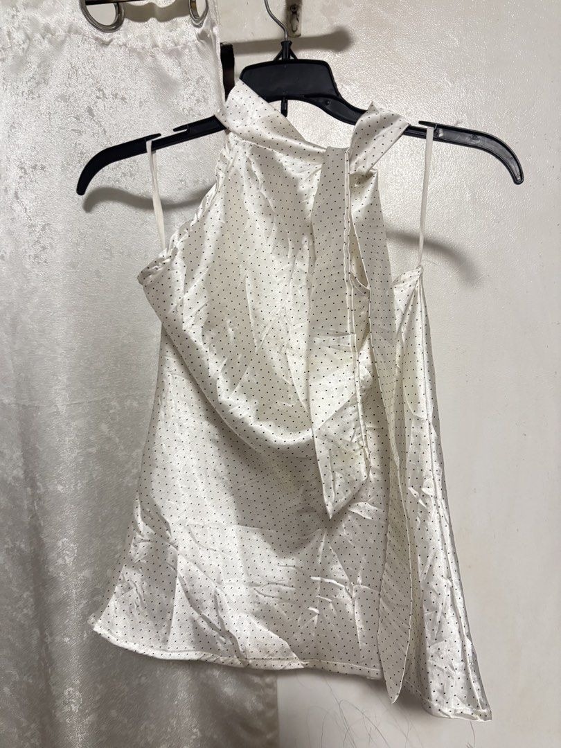 FREE SF White Polka Silk Blouse (Category: Blouses) located in Pozorrubio. Submitted by ryeisdecluttering (Listing ID 1464449402, Image 1). Description: Size small J&T express Gcash/Maya/BPI.