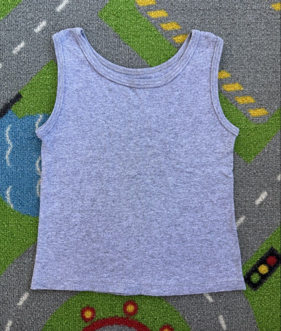 Fruit of the Loom Sando Top (Category: Babies & Kids Fashion) located in Rizal. Submitted by preloovved (Listing ID 1464395193, Image 1). Description: Comfy grey ribbed tank top. Sleeveless, round neck. Perfect for layering or solo wear. Everyday essential. Cozy kids’ pajama pants with a fun monkey print! Deep red color with red cuffs and waistband. Monkeys in hats and scarves. Perfect for bedtime. Preloved, 12-18mos Meet-up only in GB1 San Mateo