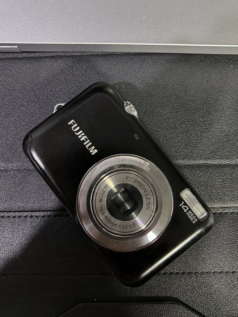 Fujifilm Digicam (Category: Cameras) located in Bulacan. Submitted by ajtwozero (Listing ID 1464509533, Image 1). Description: - Black Fujifilm FinePix JV - 14 Megapixels - Comes with charging cable - Tested and confirmed working -7/10 condition, no issues with the buttons -manage expectation, unit is old but well taken care off.