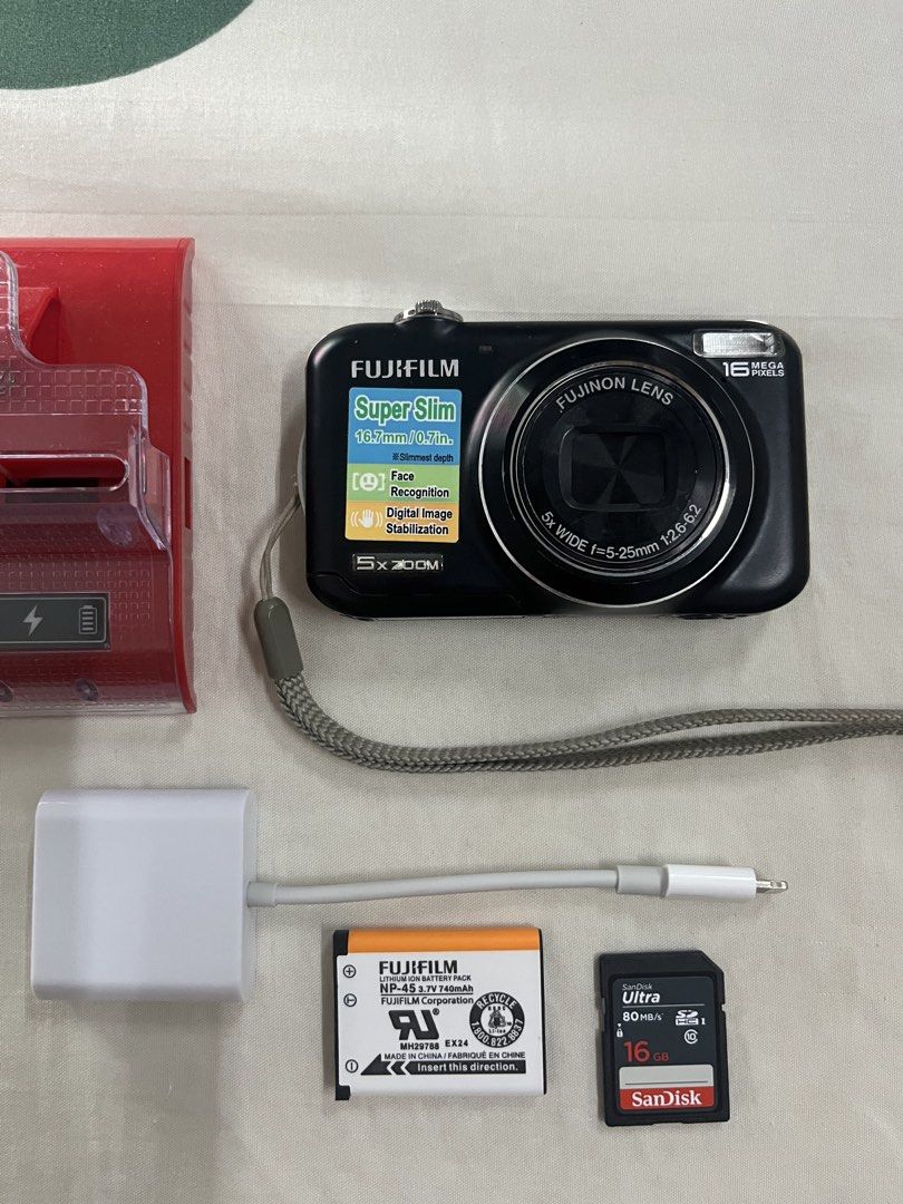 Fujifilm Super Slim Digital Camera with Accessories (Category: Cameras) located in Quezon City. Submitted by beaaatrizzz (Listing ID 1464447188, Image 2). Description: - Fujifilm Super Slim Digital Camera 16.7mm/0.7 in. -Face recognition -Digital image stabilization -5x optical zoom -16 mega pixels Comes w/ universl charger, card reader, battery & 16gb sandisk sd card pm for more details! 😊 loc: qc/mm mop: gcash, bpi mod: meet up, lalamove.