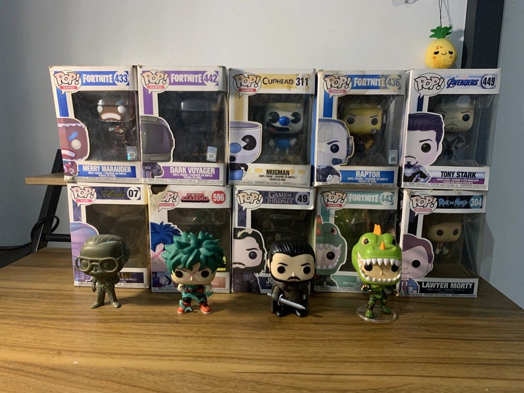 Funko Pop Lot (Category: Figurines & Statues) located in Manila. Submitted by sellingmy.stuff (Listing ID 1464364526, Image 2). Description: - Funko Pop Lot featuring popular characters - Includes figures from Marvel (Tony Stark), Fortnite (Merry Marauder, Dark Voyager, Raptor, Rex), My Hero Academia (Deku), Game of Thrones (Jon Snow), Cuphead (Mugman), and Rick and Morty (Lawyer Morty) Selling whole lot for 2k (negotiable) Figs are in good condi
