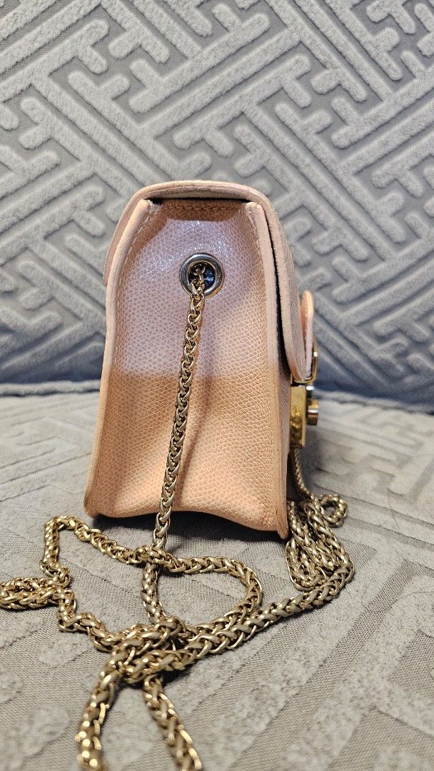 Furla Metropolis Mini Bag Pink Leather Chain Strap (Category: Luxury Bags & Wallets) located in Quezon City. Submitted by jollythrift (Listing ID 1464488658, Image 3). Description: - Authentic Pink Furla Mini Bag - Textured Leather - Elegant Gold Chain Strap - Secure Furla Clasp Closure - Compact Size: Ideal for essentials - Perfect for: Nights out, travel light, or adding a pop of color FURLA Metropolis Mini Crossbody Chain Shoulder Bag, Genuine