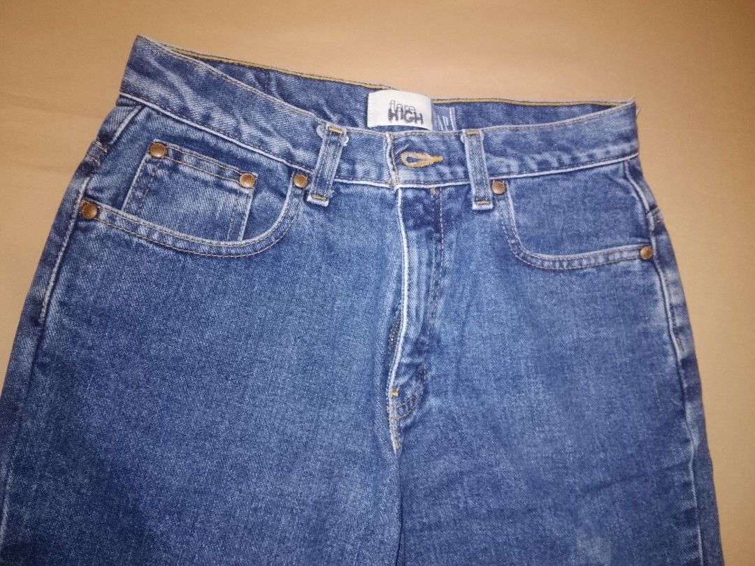 GAP High Waisted Flare Jeans Size 16 (Category: Jeans) located in Quezon City. Submitted by macieee39997 (Listing ID 1464453665, Image 2). Description: - Classic blue wash GAP jeans - High-waisted fit - Flare leg - Button and zip front closure - Two back pockets, two front pockets - Made from durable denim - Great for everyday wear.
