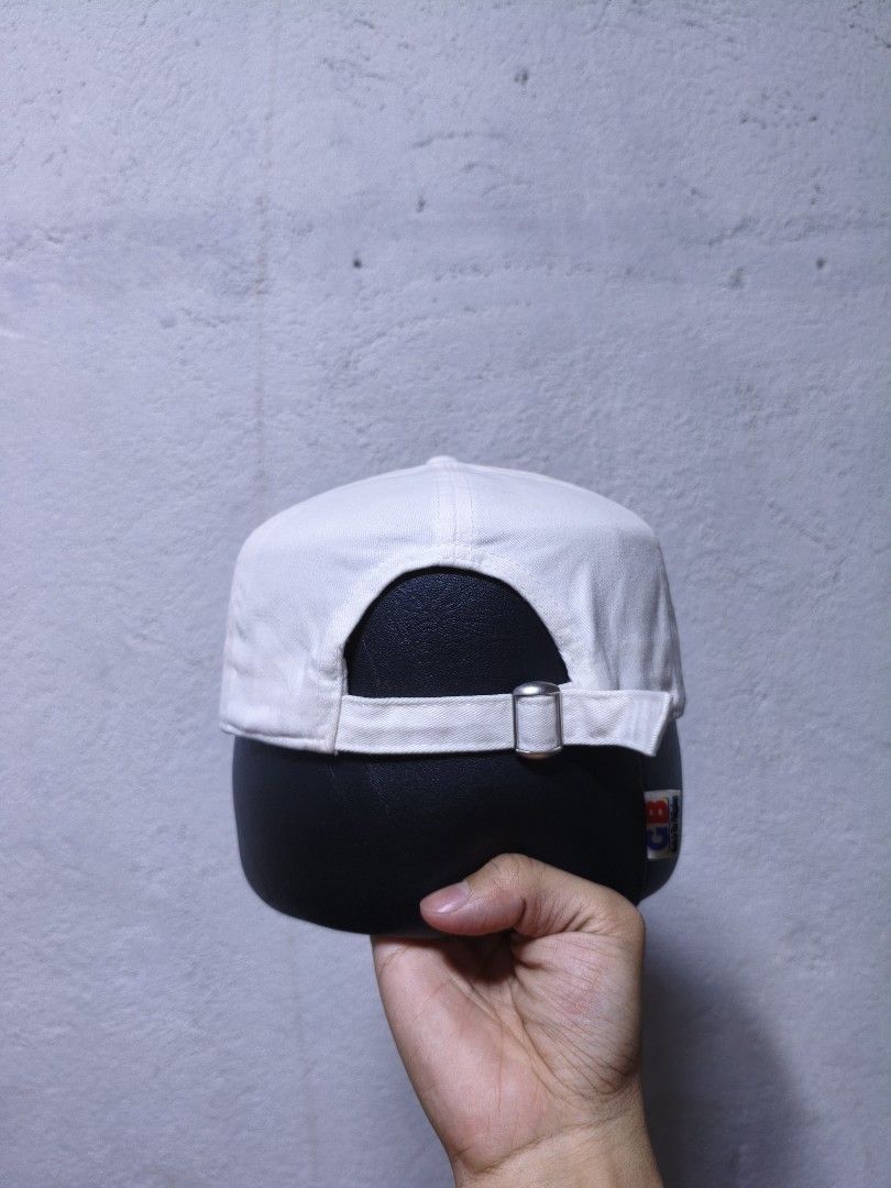 GAP Rainbow Logo Baseball Cap (Category: Caps & Hats) located in Malilipot. Submitted by aronbigorn96320 (Listing ID 1464489500, Image 2). Description: - White baseball cap from GAP - Features iconic rainbow embroidered GAP logo - Adjustable strap at the back for a custom fit - One size fits most - Perfect for everyday casual style.