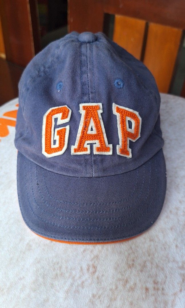 Gap toddler cap (Category: Babies & Kids Fashion) located in Santa Cruz. Submitted by sohba (Listing ID 1464387367, Image 1). Description: xs can fit 9m to 1.5y color navy/orange.