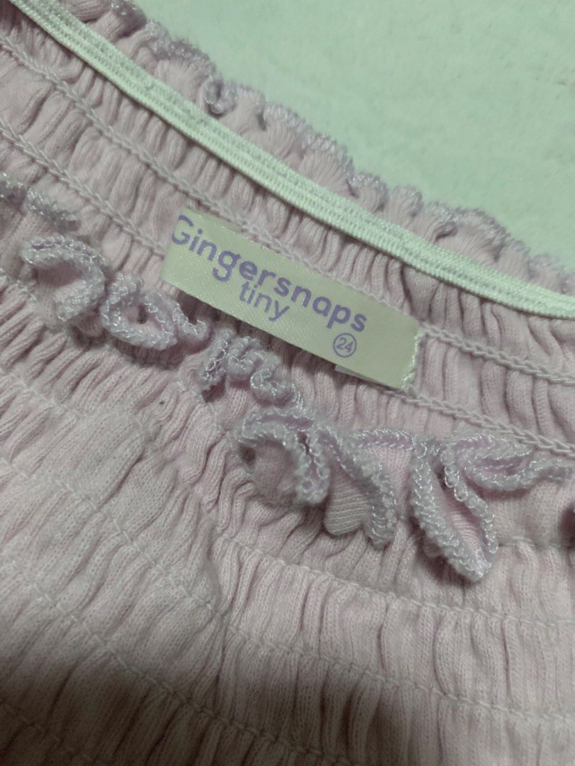 Gingersnaps Tiny Pink Smocked Skirt Size 24 Months (Category: Babies & Kids Fashion) located in Malabon City. Submitted by vewonica (Listing ID 1464417026, Image 2). Description: - Cute pink skirt from Gingersnaps Tiny - Features a smocked waistband with ruffles - Made from soft and flowy fabric - Versatile for everyday wear or special occasions - Easy to pair with various tops.