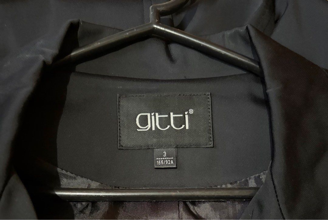 Gitti Black Trench Coat Small - Large (Category: Coats, Jackets and Outerwear) located in Quezon City. Submitted by garagesale2026 (Listing ID 1464566004, Image 3). Description: - Preloved - In good condition - Dry clean maintained - Size 3 on tag, fits up to Large - WAist: 37.5"; Length: 34.5".