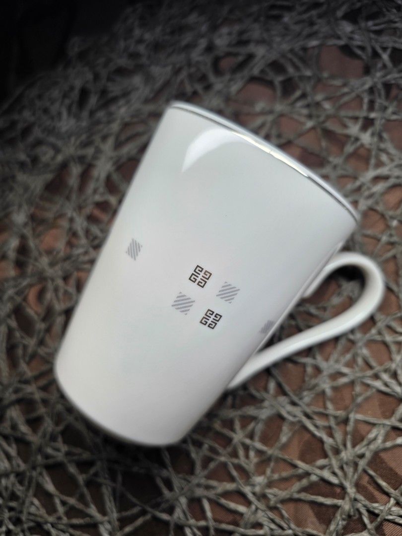 Givenchy mug (Category: Coffee & Tea Tableware) located in Zamboanga. Submitted by lunavinum (Listing ID 1464448820, Image 2). Description: Givenchy Japan Mug Approx meas: 3x4 inches Condition: Minor silver rub 220.