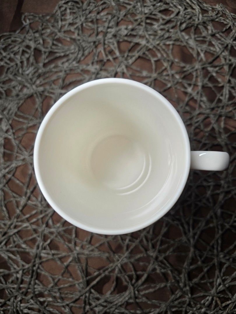 Givenchy mug (Category: Coffee & Tea Tableware) located in Zamboanga. Submitted by lunavinum (Listing ID 1464448820, Image 3). Description: Givenchy Japan Mug Approx meas: 3x4 inches Condition: Minor silver rub 220.