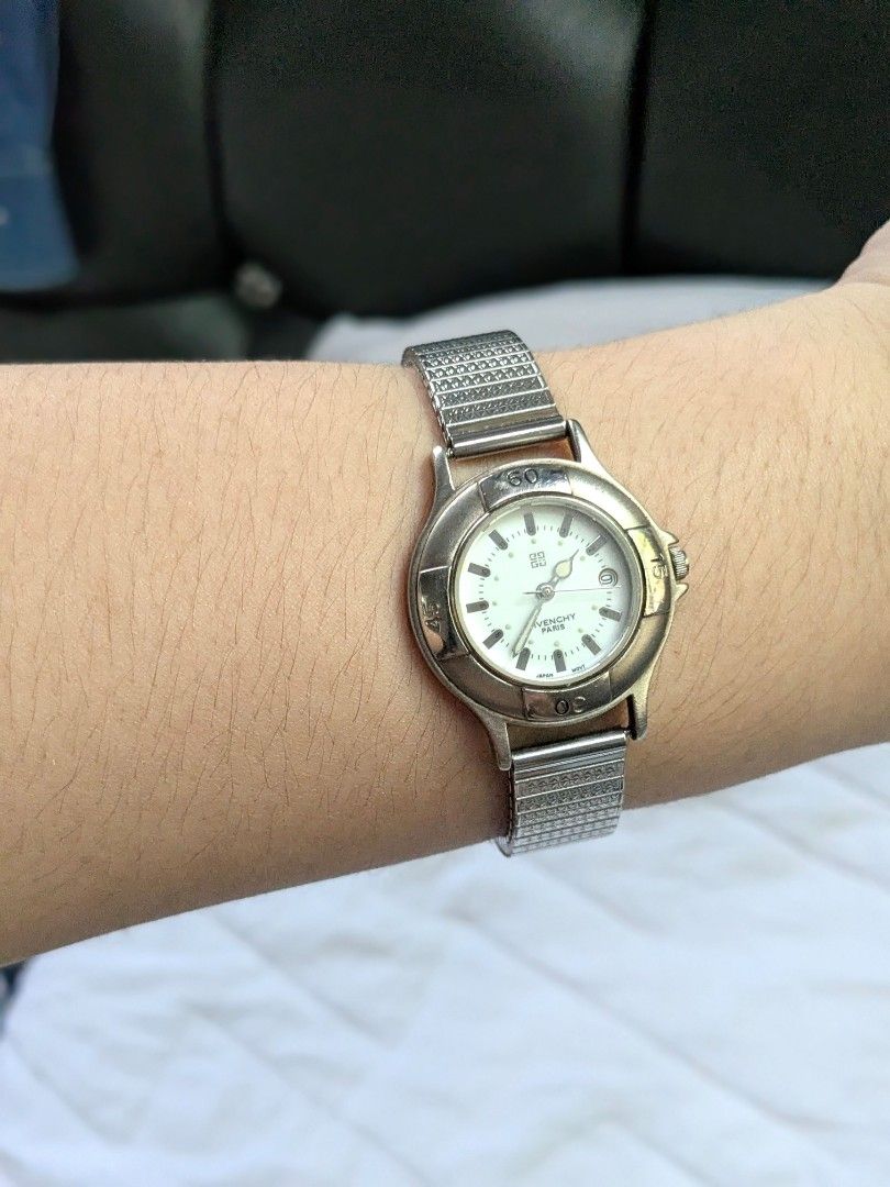Givenchy Royal Sport Watch (Category: Luxury Watches) located in Quezon City. Submitted by nnncorner (Listing ID 1464437799, Image 2). Description: Original Givenchy Life Royal Sport Vintage Timepiece Watch Stretchable Band Strap 5 peso coin size dial Fits wrist 17-22cm 8.9/10 condition Has date window No scratches or hairlines on glass face All parts are original Water Resistant Japan Movement 100% working and no need new battery With replacemen