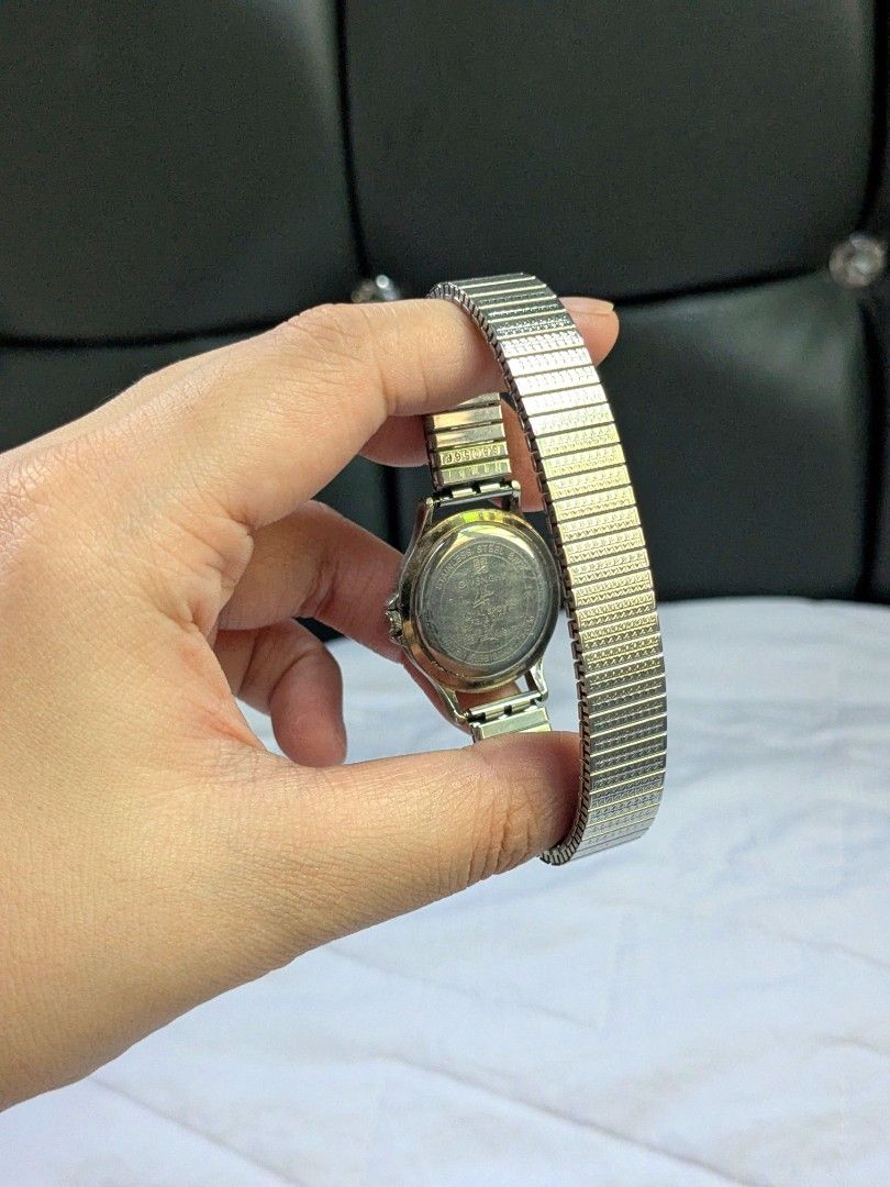 Givenchy Royal Sport Watch (Category: Luxury Watches) located in Quezon City. Submitted by nnncorner (Listing ID 1464437799, Image 3). Description: Original Givenchy Life Royal Sport Vintage Timepiece Watch Stretchable Band Strap 5 peso coin size dial Fits wrist 17-22cm 8.9/10 condition Has date window No scratches or hairlines on glass face All parts are original Water Resistant Japan Movement 100% working and no need new battery With replacemen