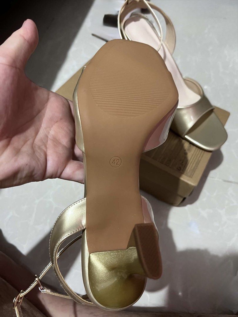 Gold Strappy Heels with Ankle Strap (Category: Heels) located in Manila. Submitted by din.sk (Listing ID 1464421867, Image 2). Description: - Gold strappy heels - Open toe design - Block heel - Ankle strap for secure fit - Great for dressing up outfits - Perfect for parties or a night out.