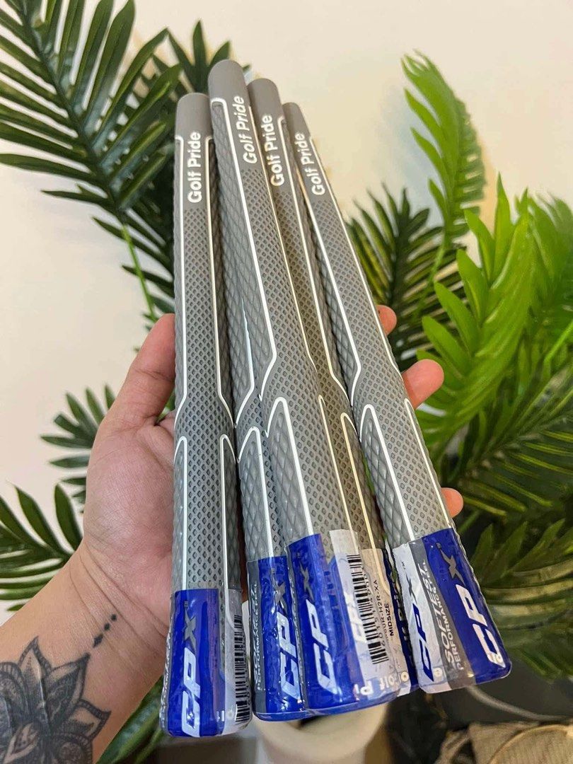 Golf Pride CPX Midsize Grips (Set of 4) (Category: Golf) located in Manila. Submitted by livefish.26c802 (Listing ID 1464518669, Image 1). Description: - Set of 4 Golf Pride CPX grips - Midsize version - Grey body with white accents - Blue butt cap - Perfect for upgrading your golf clubs -orig quality not authentic .