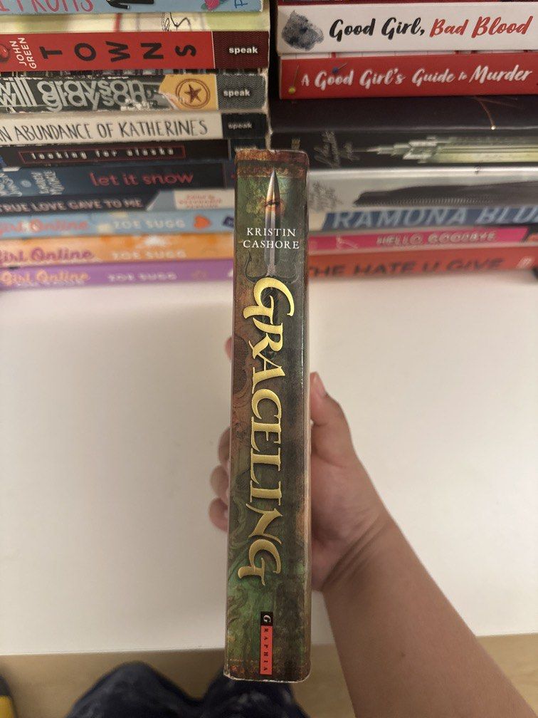 Graceling by Kristin Cashore (Category: Storybooks) located in Pasig City. Submitted by sheshels_ (Listing ID 1464419713, Image 3). Description: rfs: decluttering .