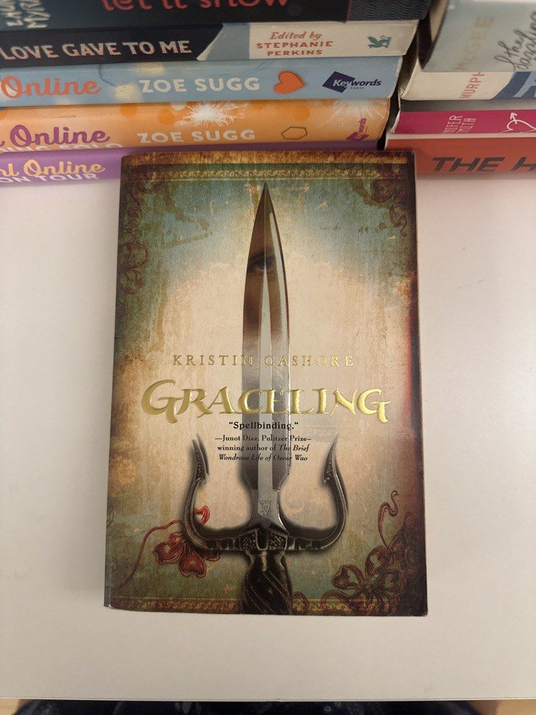 Graceling by Kristin Cashore (Category: Storybooks) located in Pasig City. Submitted by sheshels_ (Listing ID 1464419713, Image 1). Description: rfs: decluttering .