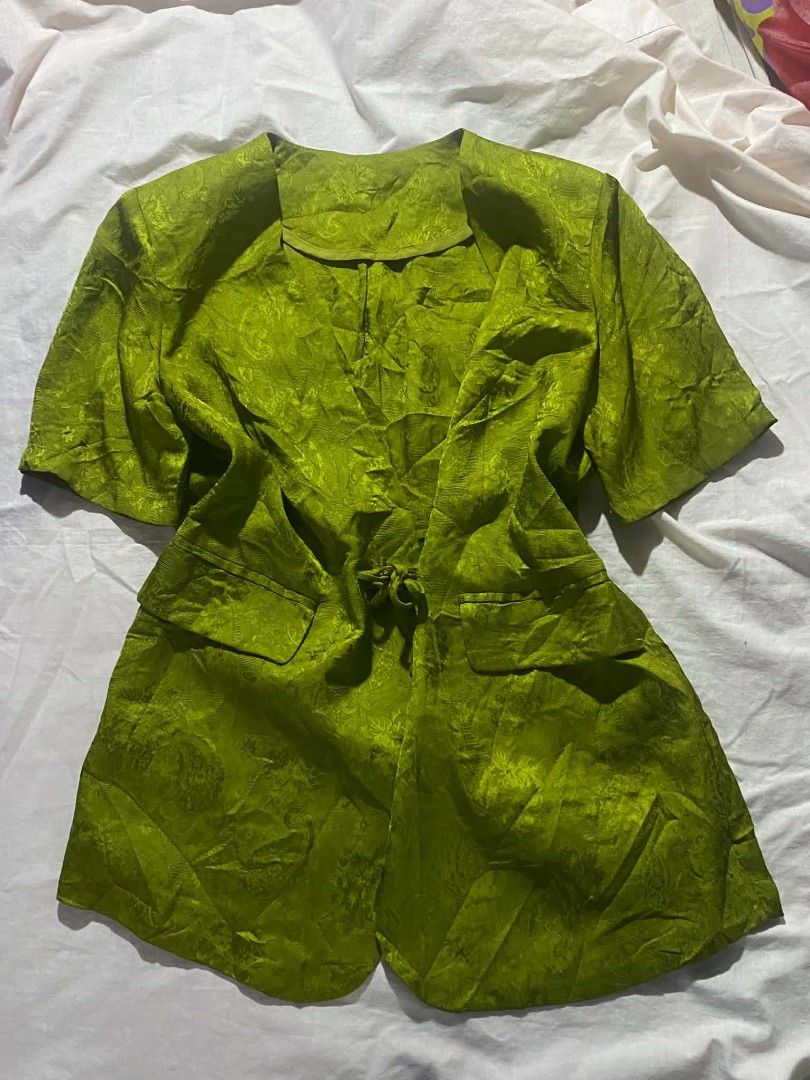 Green Textured Short Sleeve Jacket with Tie Detail (Category: Coats, Jackets and Outerwear) located in Manila. Submitted by atashaaaaa (Listing ID 1464511621, Image 1). Description: - Green textured jacket - Short sleeves - Tie detail at the front waist - Two front pockets - Unique all-over paisley-like pattern - Great for layering.