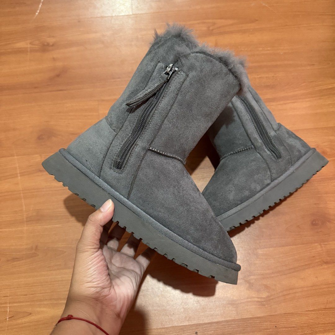 Grey sheepskin mid-calf boots (Category: Boots) located in Baguio. Submitted by puss_n_boots2600 (Listing ID 1464420062, Image 2). Description: Grey sheepskin mid-calf boots Size 36 No Flaws.
