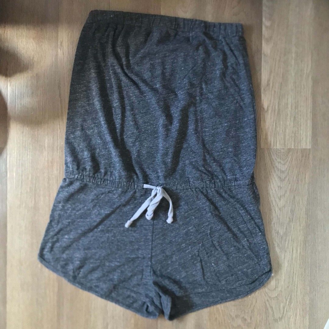 Grey Strapless Romper with Drawstring Waist (Category: Rompers) located in Manila. Submitted by joshbelgic17602 (Listing ID 1464378120, Image 1). Description: - Grey strapless romper - Elasticated top band for secure fit - Drawstring waist for adjustable comfort - Versatile for lounging or casual wear.
