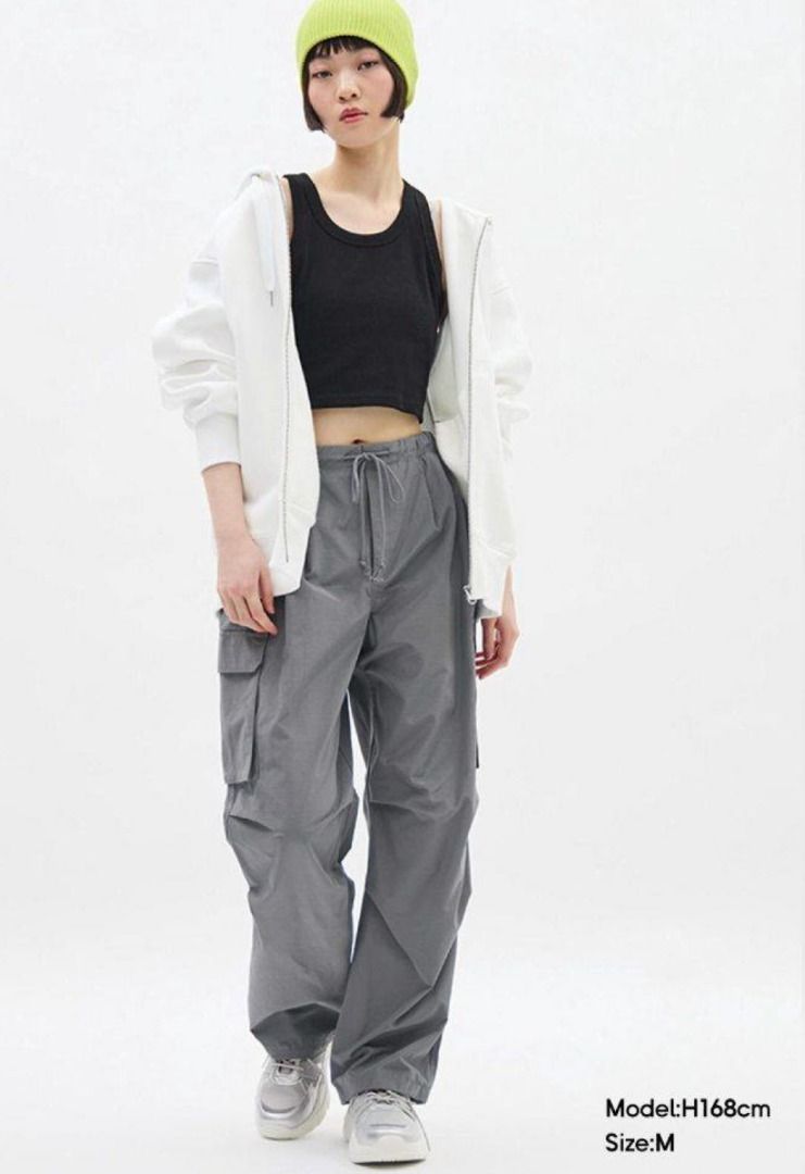 GU | Parachute cargo pants (Category: Trousers) located in Makati City. Submitted by _rentorbuy (Listing ID 1464419968, Image 2). Description: - Bought in GU Japan, out of stock in the website - Grey cargo pants - Comfortable elastic waistband - Convenient side pockets (really spacious) - Lightweight and durable material - Perfect for casual wear or outdoor activities - original price: 1700+.