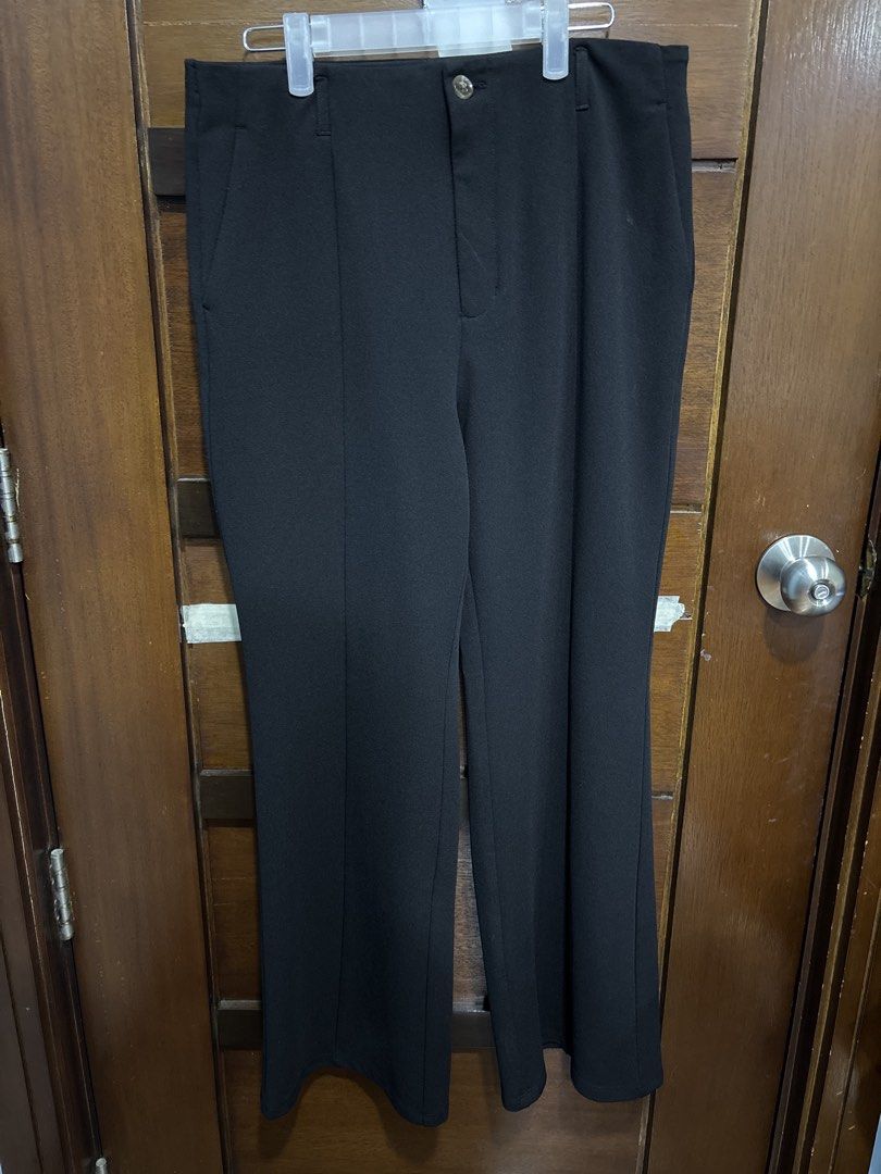 GU Black Wide Leg Pants (Category: Jeans) located in Mandaluyong City. Submitted by clothescarousel (Listing ID 1464531471, Image 1). Description: - Brand: GU Approx XL - Color: Black - Style: Wide leg pants - Material: Polyester and Polyurethane - Closure: Button and zip - Pockets: Two side pockets - Versatile: Great for casual or work wear - Fit: Comfortable.