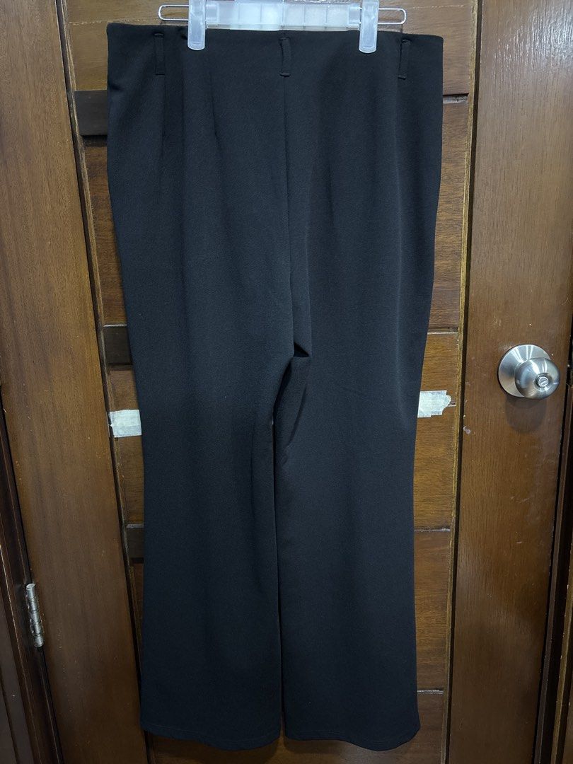 GU Black Wide Leg Pants (Category: Jeans) located in Mandaluyong City. Submitted by clothescarousel (Listing ID 1464531471, Image 2). Description: - Brand: GU Approx XL - Color: Black - Style: Wide leg pants - Material: Polyester and Polyurethane - Closure: Button and zip - Pockets: Two side pockets - Versatile: Great for casual or work wear - Fit: Comfortable.