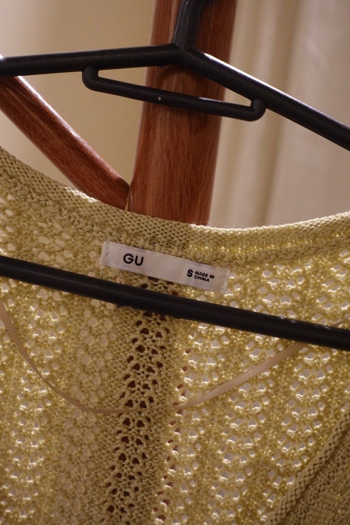 GU Knit Vest Size S (Category: Sleeveless) located in Pasig City. Submitted by hulyascloset (Listing ID 1464542710, Image 3). Description: - GU yellow knit vest - Lace-up front detail - Crochet-like texture - Ideal for layering over t-shirts or dresses - Versatile and simple styling piece COMES WITH ANOTHER TOP 🤭 BUY 1 TAKE 1 **the more items you get, the cheaper the price.